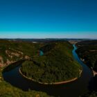 aerial view of green trees and river during daytime