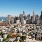 city buildings under blue sky during daytime