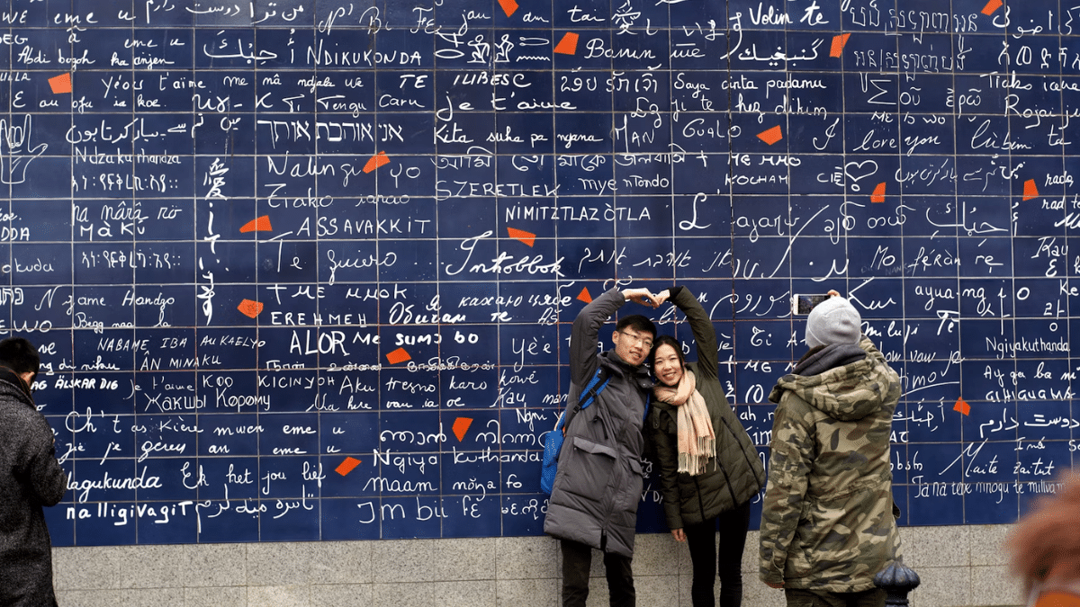 Emily in Paris: These Places Actually Exist—Here's How to Visit Them 5 Wall of Love in Paris, photo: Rodrigo Vergara Tampe / Unsplash
